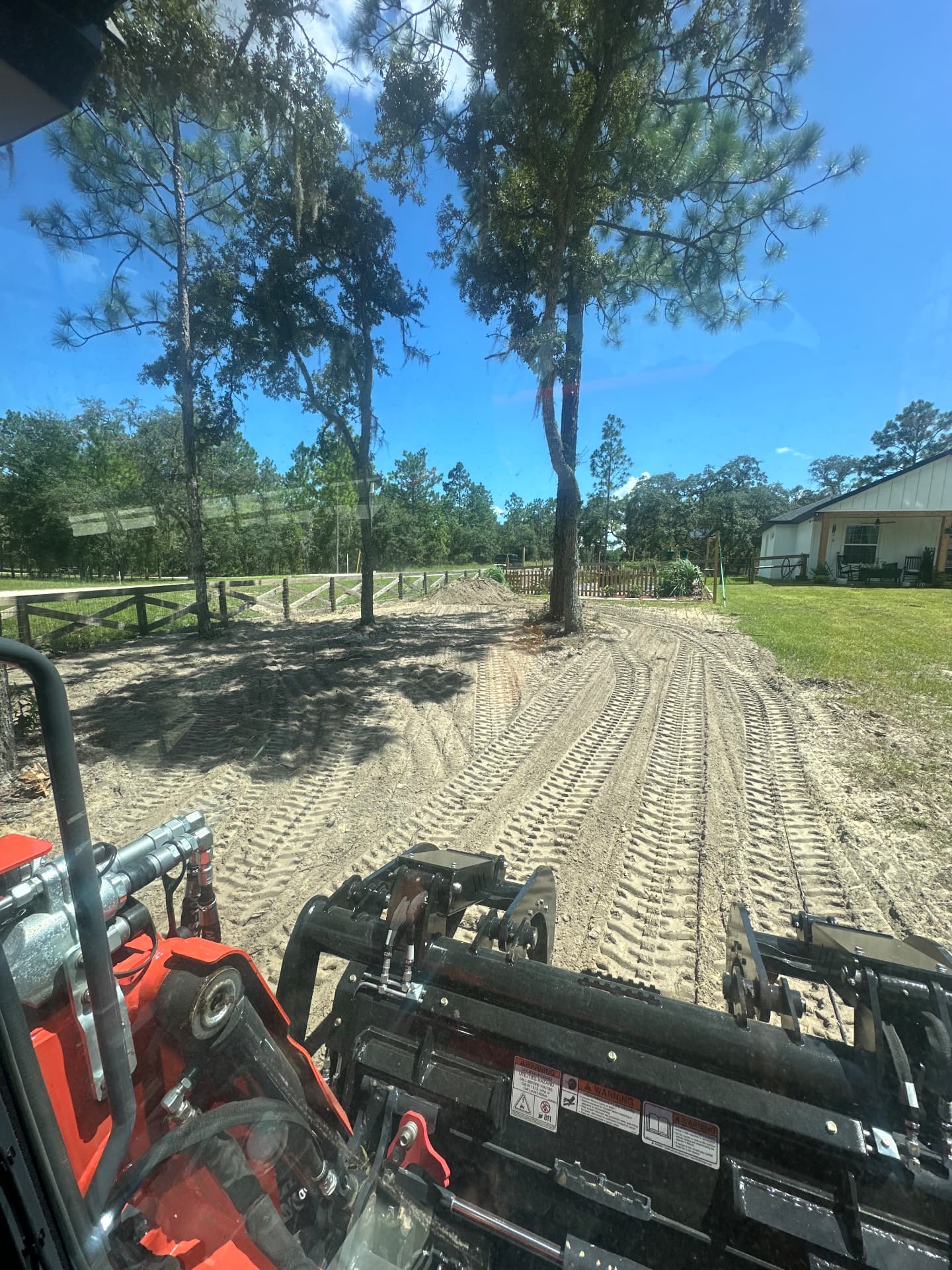 Grading and dirt work in progress on a Marion County Florida driveway